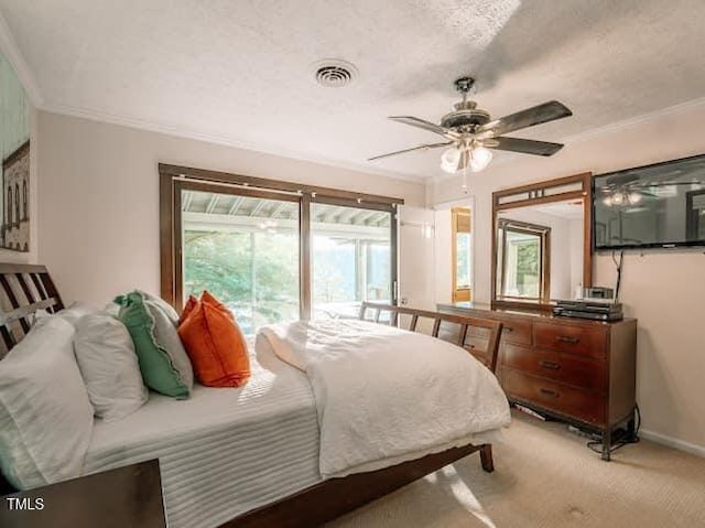 64 Robin Rd, Semora, NC 27343 - bedroom featuring light carpet, ornamental molding, a textured ceiling, and ceiling fan