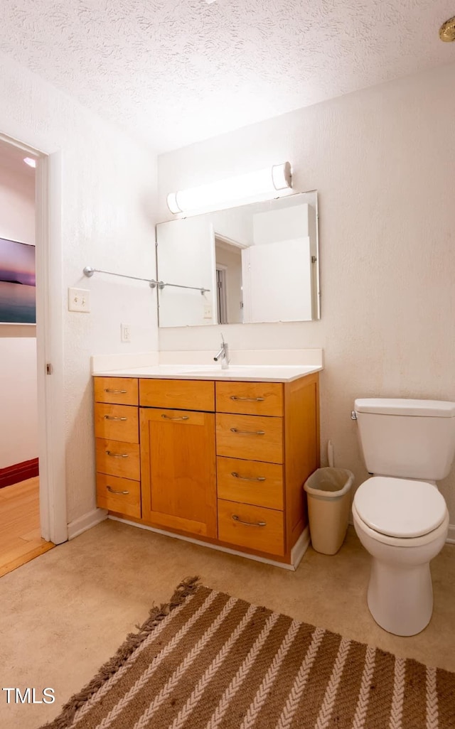 64 Robin Rd, Semora, NC 27343 - bathroom with vanity and a textured ceiling