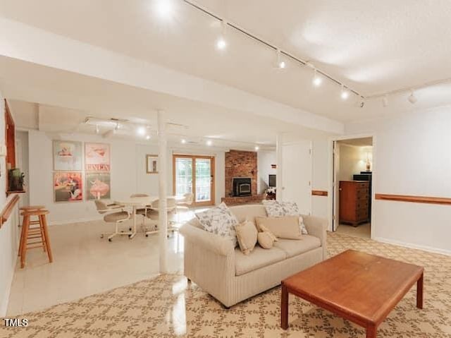 64 Robin Rd, Semora, NC 27343 - living area with track lighting and a brick fireplace