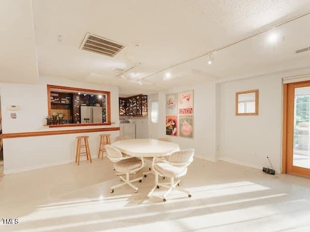 64 Robin Rd, Semora, NC 27343 - dining area with rail lighting
