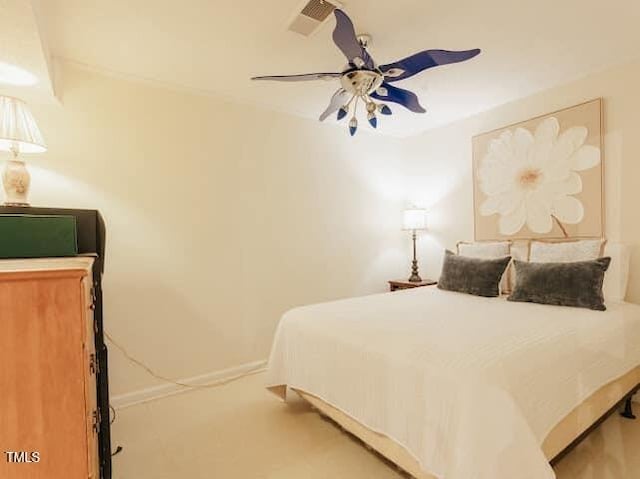 64 Robin Rd, Semora, NC 27343 - bedroom featuring a ceiling fan and baseboards