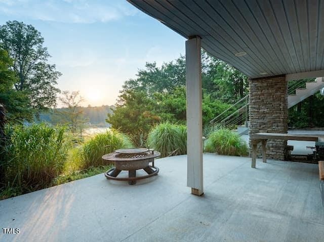 64 Robin Rd, Semora, NC 27343 - view of patio / terrace featuring a fire pit