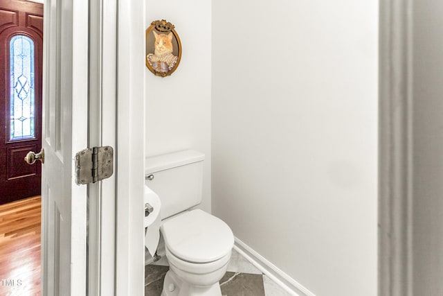 212 Heidinger Dr, Cary, NC 27511 - bathroom with toilet and wood finished floors