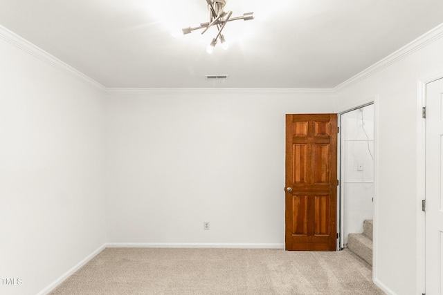 212 Heidinger Dr, Cary, NC 27511 - unfurnished bedroom with ornamental molding, carpet floors, a chandelier, and a closet