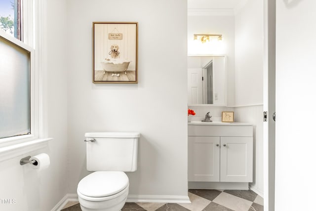 212 Heidinger Dr, Cary, NC 27511 - bathroom with vanity, crown molding, and plenty of natural light
