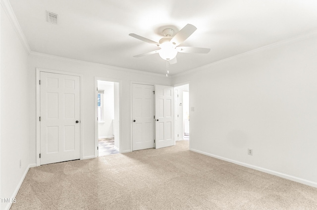 212 Heidinger Dr, Cary, NC 27511 - unfurnished bedroom with crown molding, light carpet, connected bathroom, and ceiling fan