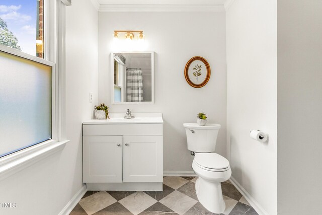 212 Heidinger Dr, Cary, NC 27511 - full bath with vanity, ornamental molding, and plenty of natural light