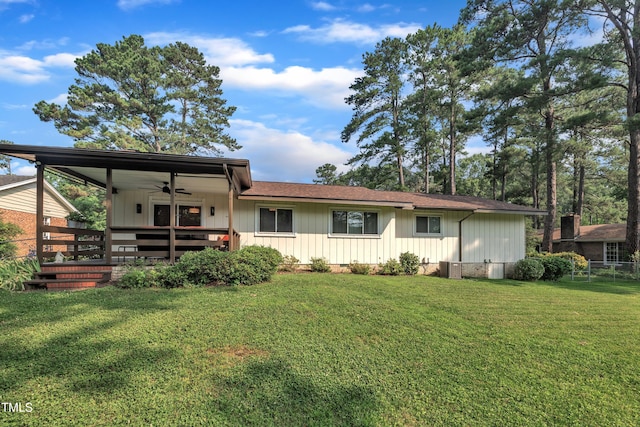 2003 Ryerson Dr, Garner, NC 27529 - back of property with ceiling fan and a wooden deck