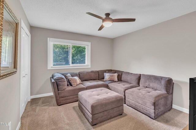 2003 Ryerson Dr, Garner, NC 27529 - living area with ceiling fan, carpet flooring, and a textured ceiling