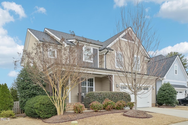1985 Firenza Dr, Apex, NC 27502 - view of front of house featuring driveway, an attached garage, and roof with shingles