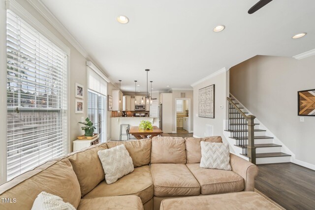 1985 Firenza Dr, Apex, NC 27502 - living area featuring ornamental molding, recessed lighting, stairway, wood finished floors, and a ceiling fan