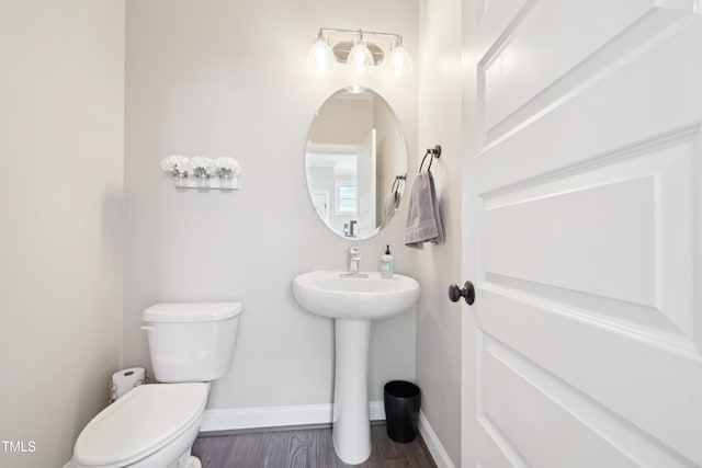 1985 Firenza Dr, Apex, NC 27502 - half bath with toilet and wood finished floors