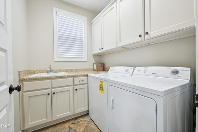 1985 Firenza Dr, Apex, NC 27502 - laundry room featuring washing machine and dryer and cabinet space