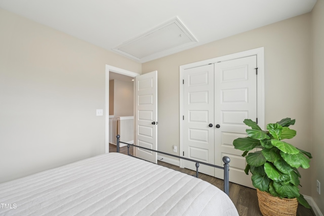 1985 Firenza Dr, Apex, NC 27502 - bedroom with attic access, wood finished floors, and a closet