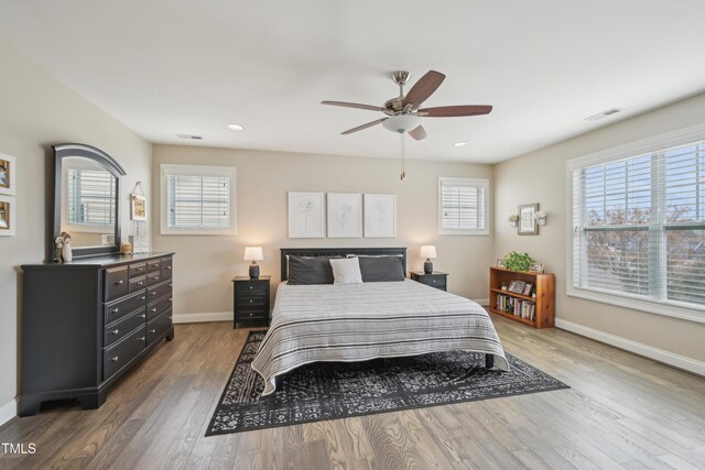 1985 Firenza Dr, Apex, NC 27502 - bedroom featuring wood finished floors, recessed lighting, and ceiling fan