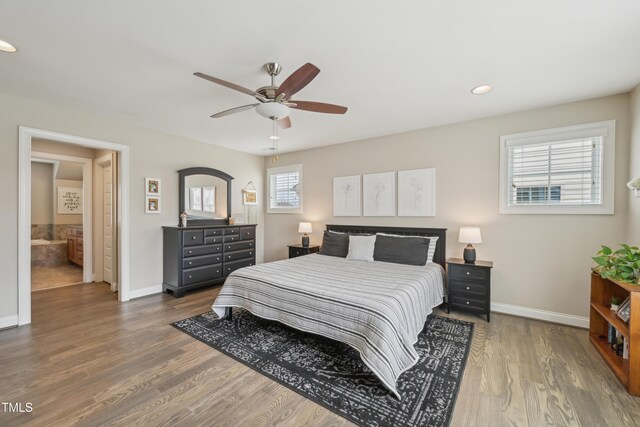 1985 Firenza Dr, Apex, NC 27502 - bedroom with wood finished floors, a ceiling fan, and recessed lighting