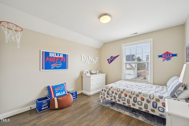 1985 Firenza Dr, Apex, NC 27502 - bedroom with dark wood-style floors and lofted ceiling