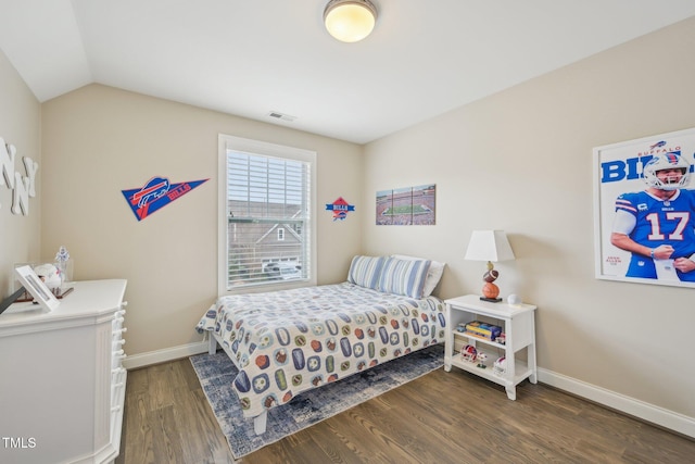1985 Firenza Dr, Apex, NC 27502 - bedroom featuring wood finished floors and lofted ceiling