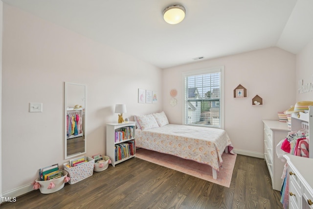1985 Firenza Dr, Apex, NC 27502 - bedroom with dark wood-style floors and vaulted ceiling