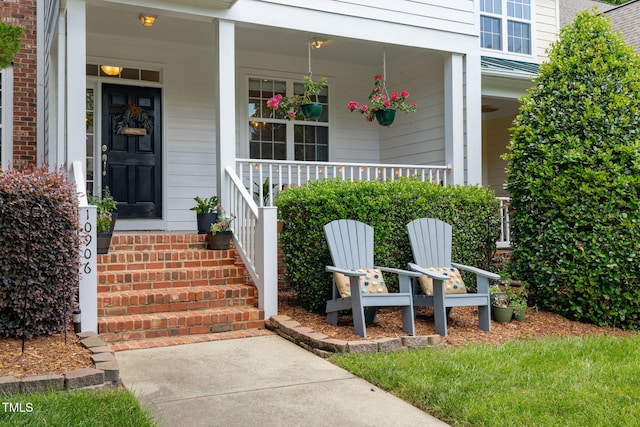 10906 Flower Bed Ct, Raleigh, NC 27614 - doorway to property with covered porch