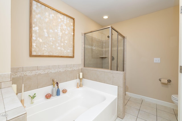 10906 Flower Bed Ct, Raleigh, NC 27614 - bathroom featuring a garden tub, tile patterned flooring, and a shower stall