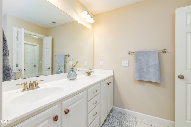10906 Flower Bed Ct, Raleigh, NC 27614 - full bathroom featuring double vanity and tile patterned flooring