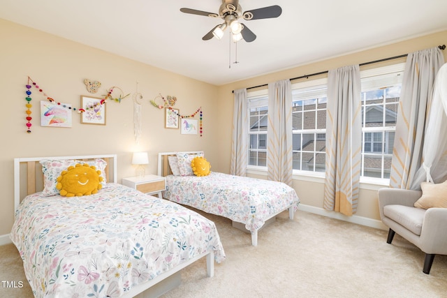 10906 Flower Bed Ct, Raleigh, NC 27614 - carpeted bedroom featuring multiple windows and ceiling fan