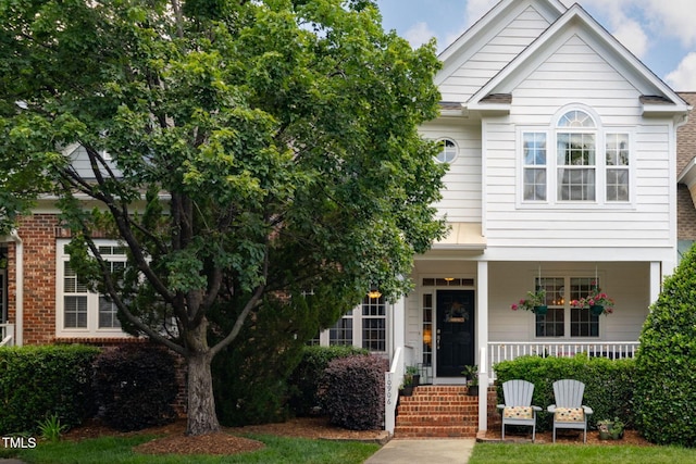 10906 Flower Bed Ct, Raleigh, NC 27614 - view of front facade featuring a porch