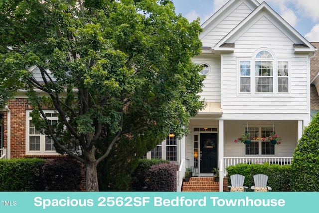 10906 Flower Bed Ct, Raleigh, NC 27614 - view of front facade with a porch