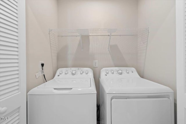 6620 Pathfinder Way, Raleigh, NC 27616 - laundry area featuring washing machine and clothes dryer