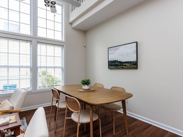 1103 Mallory Ln, Durham, NC 27713 - dining space with baseboards and dark wood-style flooring