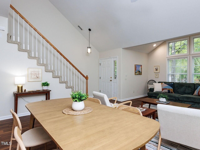 1103 Mallory Ln, Durham, NC 27713 - dining area with dark wood-type flooring, high vaulted ceiling, stairs, and recessed lighting