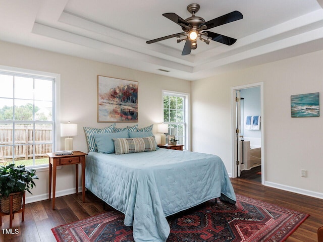 1103 Mallory Ln, Durham, NC 27713 - bedroom with a raised ceiling, wood finished floors, and ceiling fan