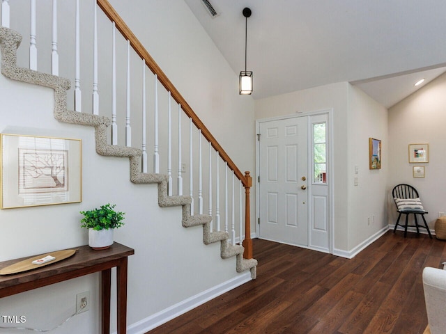 1103 Mallory Ln, Durham, NC 27713 - foyer entrance with wood finished floors, stairway, and high vaulted ceiling