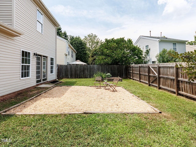 1103 Mallory Ln, Durham, NC 27713 - fenced backyard featuring a patio area
