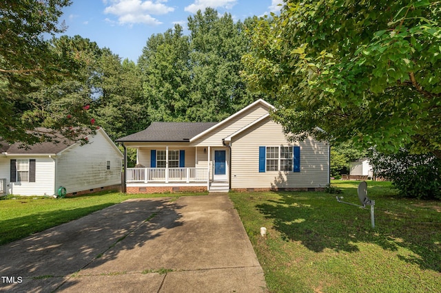 1261 Grovewood Dr, Clayton, NC 27520 - view of front facade with crawl space, covered porch, and a front yard