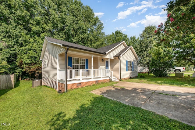 1261 Grovewood Dr, Clayton, NC 27520 - view of front of house featuring covered porch, crawl space, and a shingled roof
