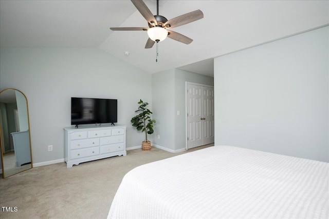 979 Branch Line Ln, Apex, NC 27502 - bedroom with light colored carpet, vaulted ceiling, ceiling fan, a closet, and arched walkways