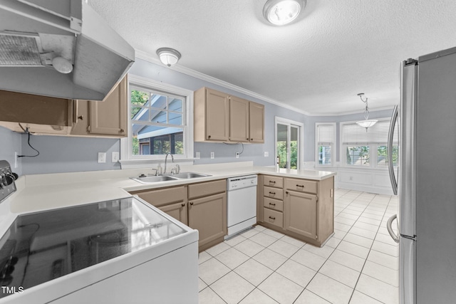 2205 Bufflehead Rd, Raleigh, NC 27616 - kitchen with white appliances, a peninsula, ventilation hood, a textured ceiling, and ornamental molding