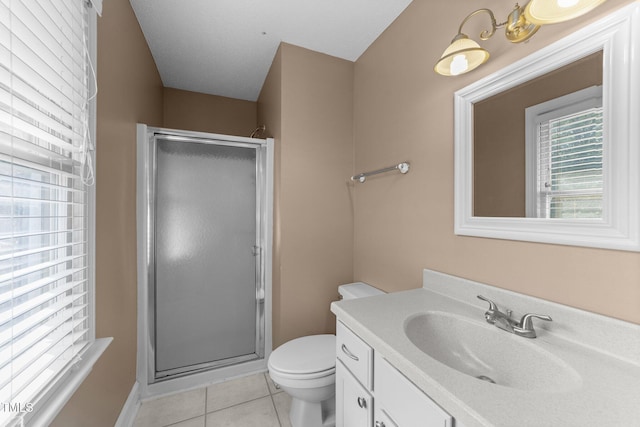 2205 Bufflehead Rd, Raleigh, NC 27616 - full bathroom featuring a stall shower, vanity, and tile patterned floors