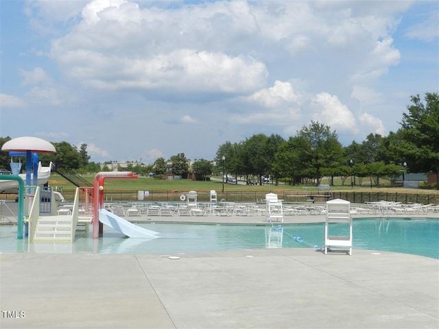 617 Woodson Dr, Clayton, NC 27527 - community pool with a water slide and a patio