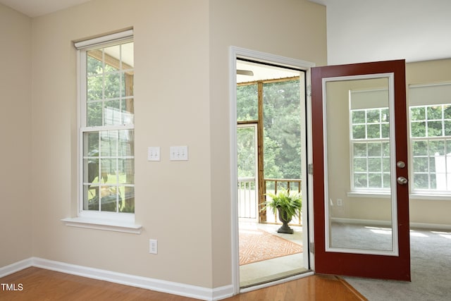 617 Woodson Dr, Clayton, NC 27527 - doorway featuring plenty of natural light, french doors, and wood finished floors
