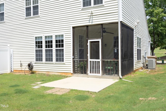 617 Woodson Dr, Clayton, NC 27527 - back of property with a sunroom, a lawn, and a patio