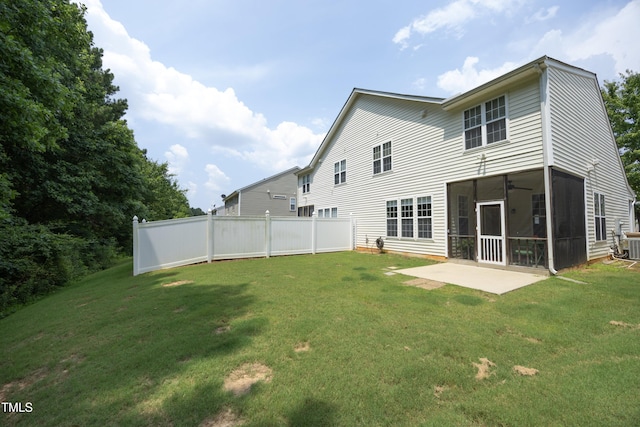 617 Woodson Dr, Clayton, NC 27527 - back of house featuring a patio area and a sunroom