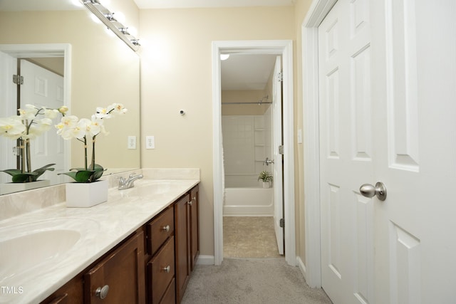 617 Woodson Dr, Clayton, NC 27527 - bathroom featuring double vanity and bathing tub / shower combination