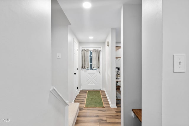 7286 Shellburne Dr, Raleigh, NC 27612 - hall featuring wood finished floors and recessed lighting