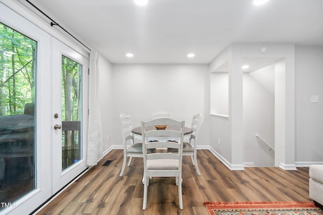 7286 Shellburne Dr, Raleigh, NC 27612 - dining room with wood finished floors and recessed lighting