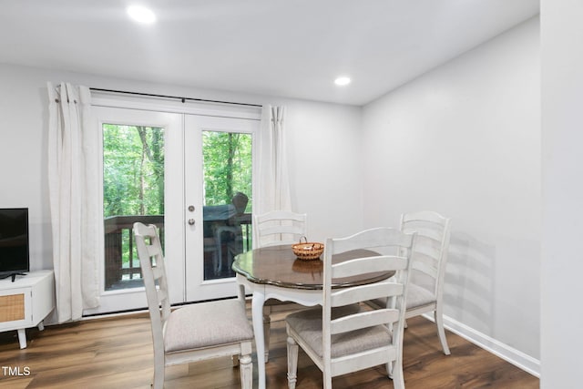 7286 Shellburne Dr, Raleigh, NC 27612 - dining space featuring wood finished floors, french doors, and recessed lighting