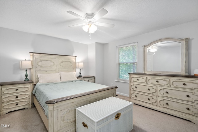 7286 Shellburne Dr, Raleigh, NC 27612 - bedroom with light carpet, a ceiling fan, and a textured ceiling