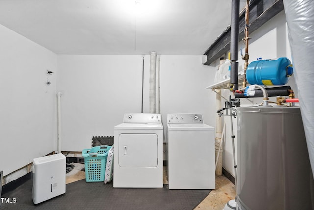 7286 Shellburne Dr, Raleigh, NC 27612 - laundry room featuring electric water heater and independent washer and dryer